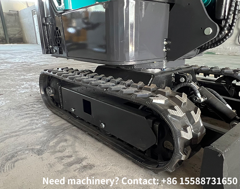 What is the function and adjustment method of the track tensioning device for a crawler excavator?